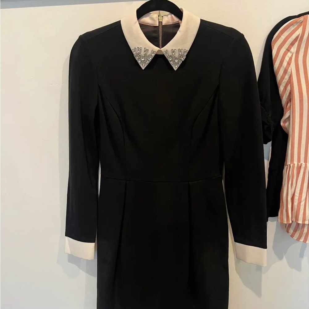 Elegant Black Dress with White Accents
